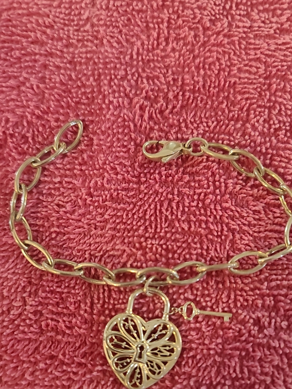Tiffany & Co. Stearling Silver  Heart Locket Charm Bracelet with Key Accent